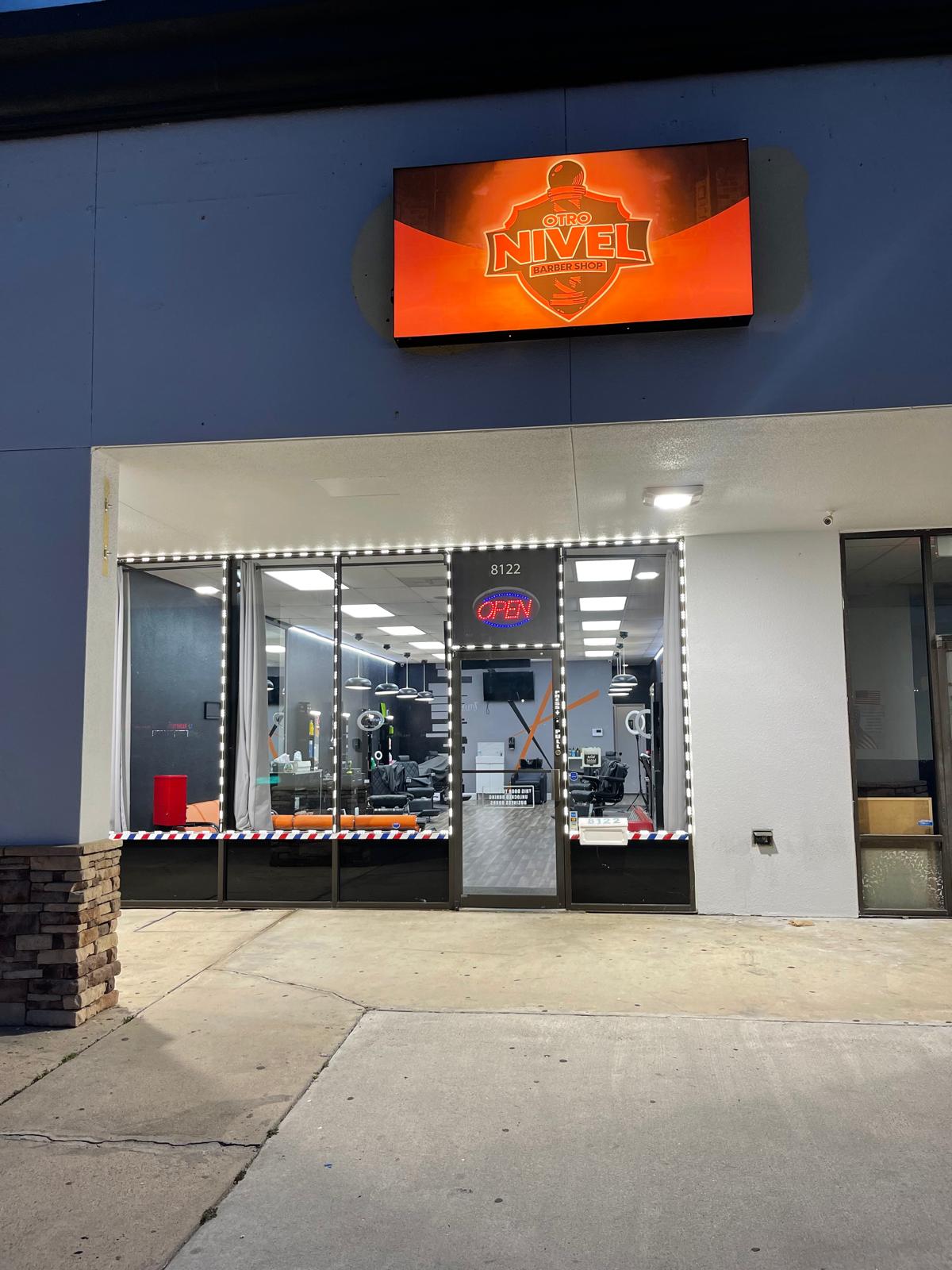 Fachada exterior de Otro Nivel Barbershop